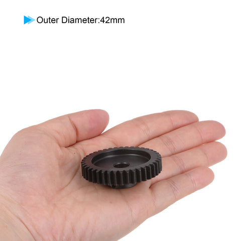Person holding Mod 1 40T Pinion Gear For RC Cars And Trucks With 8mm Bore Hardened Steel Spur Gear, 42mm outer diameter
