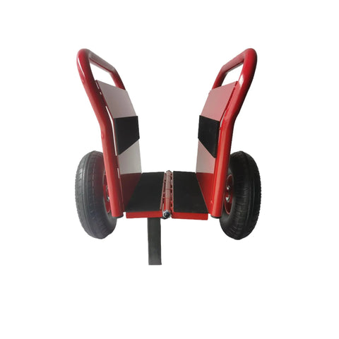 No Sweat Heavy Duty Panel Dolly Cart With One Thousand Pound Capacity And Ten Inch Reliable Solid Rubber Tires For Easy Drywall Loads Heavy Door Slides And Contractor Gear Runs In Glossy Red, showing rear view with rubber tires.