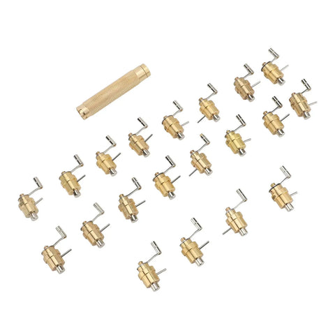 Pro Grade Brass Watch Winder Set For Precision Mainspring Winding, 20 Included, workshop kit tools spread out on white background