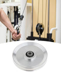 CNC Machined Bearing Pulley Wheel For Strength Training Equipment And Gym Machines 120mm Silver Aluminum Alloy Replacement Part showing cable use