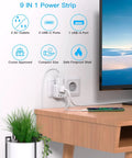 9-in-1 power strip with 2 AC outlets, 2 USB-C ports and 1 USB-A port; compact white with fireproof shell at wall outlet.