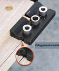 3 In 1 Doweling Jig Drill Kit With Adjustable Guide and embedded nuts for woodworking pocket holes, close-up view.