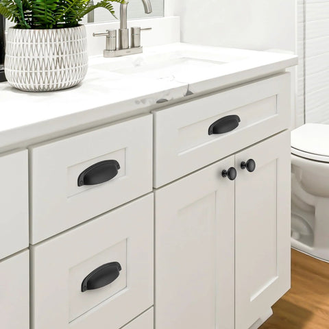 10 Pack Matte Black Cup Pulls Three And Three Quarters Inch Hole Center Zinc Alloy Cabinet Handles installed on white bathroom drawers