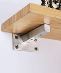 Rock Solid Two Pack Heavy Duty Wall Mounted Shelf Brackets Crafted From Brushed Stainless Steel With Zero Flex Support Frame For Living Room And Bedroom Includes All Basic Hardware, showing bracket attached to wooden shelf.