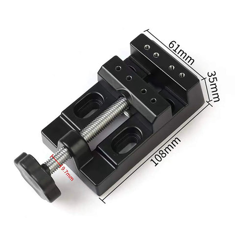 Mini Bench Clamp Vise for Jewelry and Watch Repair, flat table mount with adjustable jaws, lightweight aluminum alloy, 4.2x2.4x1.37 inches, 0-2.1 inch clamp.