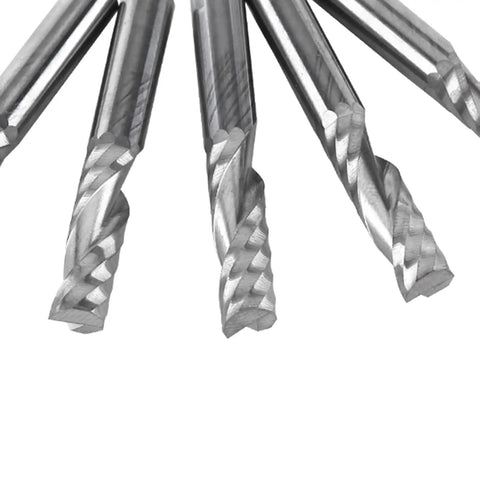 Close-up of 5Pcs 6mm Shank Tungsten Carbide Single Flute End Mills Spiral CNC Milling Bits For Acrylic PVC MDF with sharp edges.
