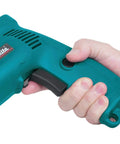 Close-up of hand holding Powerful 4.9 Amp 3/8 Inch Drill with Variable Speed 0-2500 RPM Keyless Chuck in teal finish