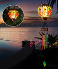 Solar Wind Chimes For Outdoors Featuring Cardinal Hot Air Balloon Glass Wind Chimes With Flickering Flame Night Light by poolside
