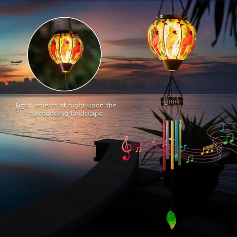 Solar Wind Chimes For Outdoors Featuring Cardinal Hot Air Balloon Glass Wind Chimes With Flickering Flame Night Light by poolside