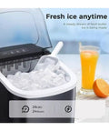 Portable Countertop Ice Maker With No Sweat Self Cleaning generates fresh ice cubes in a black and white design with scoop.