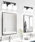 Straight Up Solid 3 Light Bathroom Vanity Lights With Square Frosted Glass Shades Matte Black Wall Sconces with mirrors in modern bathroom.