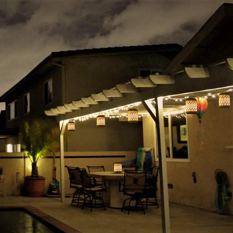 Solar Powered Outdoor Hanging Lanterns For Garden And Patio, Waterproof Landscape Lights illuminating a patio at night
