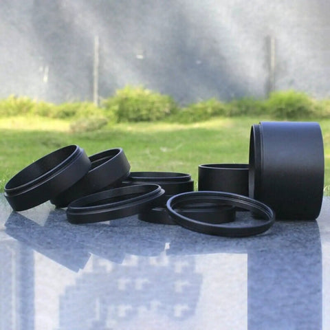 Stackable M48X0.75mm Extension Tubes Set for Cameras and Telescopes Aluminum Black Finish outdoors on concrete surface