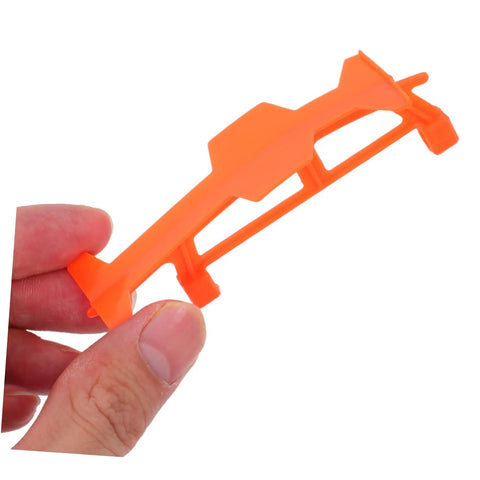 Close-up of a hand holding an orange bracket from a 5 Piece Glider Plane Bracket Kit With Rubber Band Power For Do It Yourself Aircraft Builds
