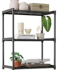 Kick Dust Bunnies Out The Door With This Solid 3 Tier Metal Storage Shelf, black metal organizer with plants and decor.