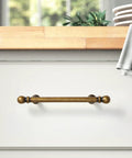 Antique Brass Drawer Pull on white dresser, solid zinc, aged bronze finish, 3-3/4 inch center, part of set of 10 handles