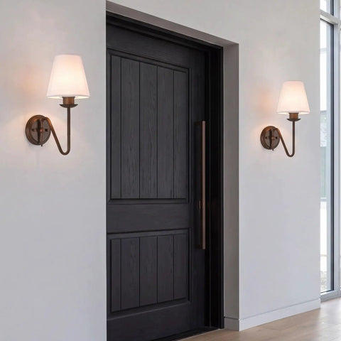 YS.ESUDSI Vintage Wall Sconces with White Handmade DIY Fabric Shade E26 mounted beside a dark door in entryway.