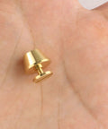 Top Shelf Solid Brass Screw Back Metal Studs With Knockout Gold Finish, 9mm stud in palm, ideal for leather craft and handbag hardware.