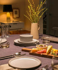 Dining table set with plates, cutlery, and centerpiece under Soft White LED Bulbs 60W Equivalent G25 Frosted Globe with Medium Base 3 Pack