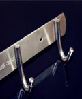 Heavy Duty Stainless Steel Wall Mount Hooks Low Profile Hidden Storage Setup Hella Durable Rust Resistant Key And Coat Rack Three Pack close-up of hooks.