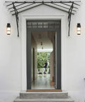 Outdoor E27 Wall Light LED Sconce With Glass Waterproof Lantern for Patio, Rustic Modern Design beside doorway
