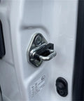 Universal Car Door Lock Dampers That Straight Up Kill The Rattle For Smooth Closings Boost Noise Damping Ease Hinge Strain Heavy Duty Auto Silent Install Kit close-up on vehicle door latch and mount.