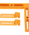 CNC Workpiece Positioning Fixture Kit with Vise Clamp and Side Clamping shown for T Slot Perforated Tables, precision tools in orange