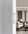 Pocket Door Pull Handle Edge Pull Satin Nickel Flush Mount For Sliding Doors 2 Pack With Self Retracting Mechanism Fits Doors Over Eleven Sixteenth Inches Thick Stainless Steel Finish Rust Resistant And Easy To Install installed on a door with a modern interior background.