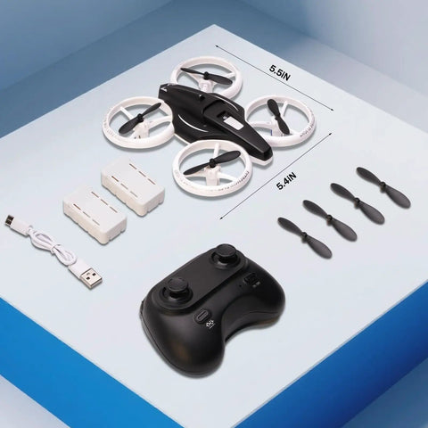 Kids RC Drone With Altitude Hold Headless Mode Propeller Guards LED Lights And 3 Speed Modes Easy One Key Takeoff And Landing Dope Gift For Boys And Girls shown with controller and accessories on table.