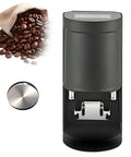 Automatic 58MM Electric Coffee Tamper Delivering Hella Even Compression Adjustable 5 To 30kg Pressure One To Three Selectable Tamp Cycles Beefy Stainless Steel Build Slick Touchscreen Control Built For Home Baristas And Cafe Pros next to coffee beans and a control button.