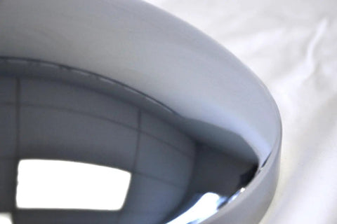 Edge detail of Set Of 4 Ten One Eighth Inch Closed Front And Rear Center Caps In Chrome For Cars Trucks And SUVs Universal Fit