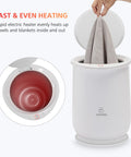 Large Towel Warmer for Bathroom with Auto Shut Off, Fast Heat Up in Minutes, demonstrated with towel insertion, top view shown