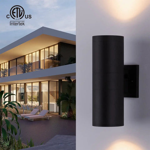 Dusk To Dawn Outdoor Porch Light Dual Head Wall Sconce with Photocell Sensor in matte black aluminum on modern house wall.