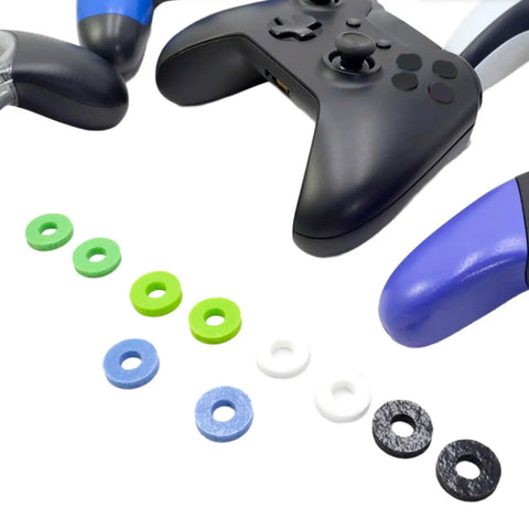 Ten Pack Controller Aim Assist Rings For Thumbsticks With Sponge Motion Control Grips shown with gaming controllers