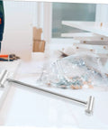 Adjustable Hinge Wrench Dual Spanner Tool with heavy-duty design on workbench for door and gate hinge adjustments.