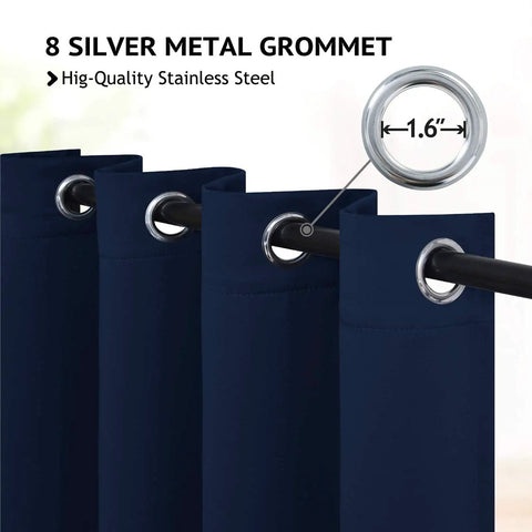 Close-up of navy blue blackout curtains with 8 silver grommets per panel, on rod. Grommet Blackout Curtains Set Of 2 Navy Blue 52 By 72 Inches Each Panel Thick Polyester Light Blocking Thermal Drapes For Bedroom Or Living Room Room Darkening With 8 Silver Grommets Per Panel.