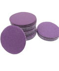 Versatile 30 Pack Sanding Discs For Drill And Rotary Tool, Premium Wet Or Dry Aluminum Oxide, 2 inch purple discs stacked.