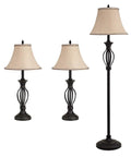 Three Piece Rustic Farmhouse Lamp Set With Beige Linen Shades, Black Metal Bases For A Cozy Living Room Vibe, Includes One Floor Lamp And Two Table Lamps, ETL Listed 110V Ready, Matching Scroll Design For Bedroom Or Office Decor, shown with beige shades and black metal bases.