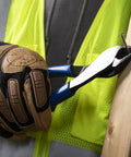 8 Inch Diagonal Pliers With Angled Head And High Leverage For Confined Spaces Cut ACSR Screws Nails And Hardened Wire Made In USA Delivering 36 Percent More Cutting Power With A Rugged Angled Head For Tight Spaces used by gloved hand to pull nail from wood