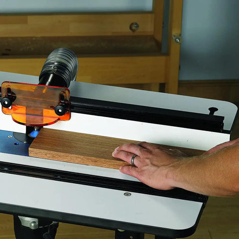 Image of a Heavy Duty Solid Phenolic Router Table Top With A Slick Ultra Flat Surface and T profile slot being used.