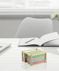 Gold Trimmed Glass Sticky Note Holder With Non Slip Pads For 3x3 Inch Notes on a modern office desk with laptop and notepad