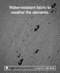 Water droplets on water-resistant fabric of Adjustable Chaise Lounge With 2 Inch Foam Pad And Portable Carry Case