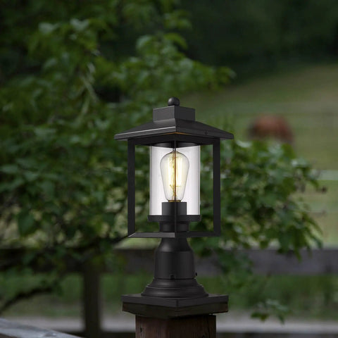 Boss Black Outdoor Post Light With Clear Glass Shade in garden setting
