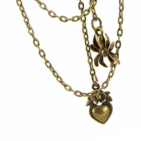 Get That Giddy Up With This Antique Gold Convertible Mechanical Gear Hair Jewelry Pin That Hits Your Daily Look Or Evening Wear While Staying Lightweight And Super Comfortable For All You Bold Fashionistas, featuring flowers and heart charms.