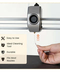 Illustration of a hand using Pro Grade 3D Printer Nozzle Cleaning Kit With Soft Rubber Handle, showing ease of use on extruder.