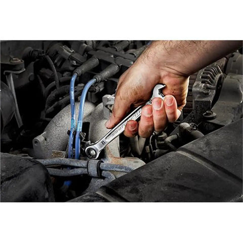Kickass 191 Piece Mechanics Tool Set With Deep Socket Wrenches Ratchets Hardened Chrome Steel For Underhood Auto Repair And Garage Builds Beast Mode Workhorse in use on a car engine with a hand holding a wrench.