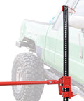 60 Inch Ratcheting Off Road Farm Jack Be Beefy 3 Ton Capacity 6,600 Lb Heavy Duty Lift next to lifted green truck