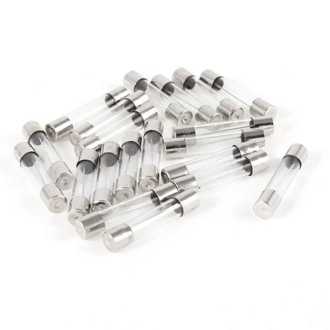 Glass fuses from Inline Fuse Holder Kit With Wire And 150 Piece Fast Blow Glass Fuses 15 Amp Ratings 0.25A to 20A, scattered on surface