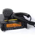 Quad Band 50W Cross Band Car Ham Radio With Alphanumeric Display CTCSS DCS DTMF 2 Tone 5 Tone FM Transceiver Covers 10M 6M 2M And 70CM Bands Remote Mount Ready High Power Mobile Radio For Enthusiasts showing front view with keypad mic