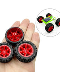 Close-up of 10 Pcs 34mm Rubber RC Car Wheels with 2mm Shafts and 5 Rod Axles Kit on a hand for RC cars and robots.